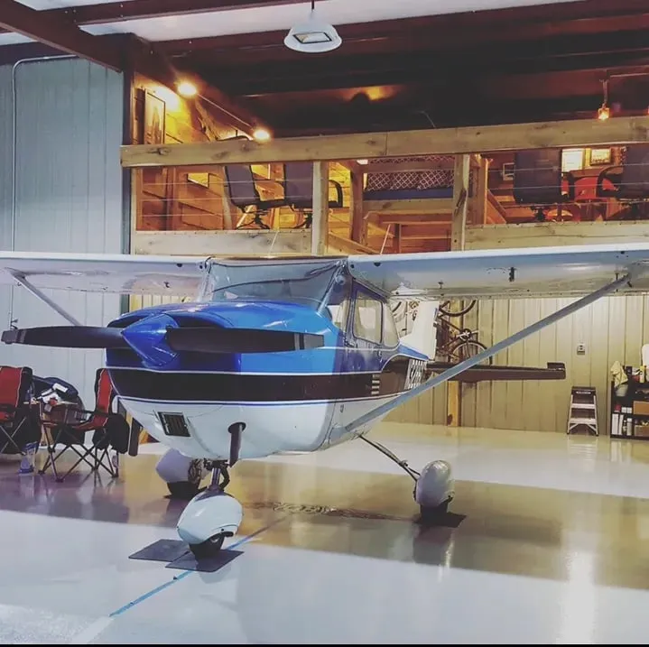Single-engine aircraft parked inside a finished Horst Co hangar